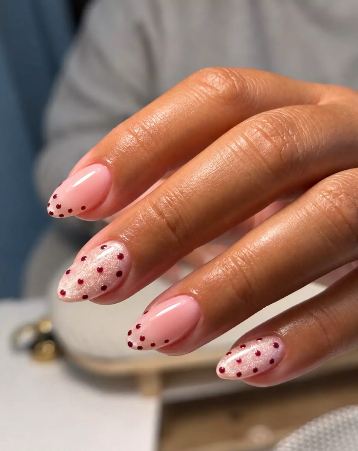Pink dots color nails by Nelly Nails NY in East Williamsburg, Brooklyn