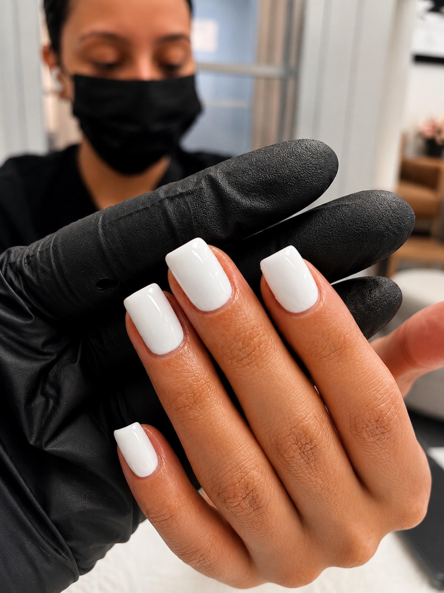 Clean white classic nails by Nelly Nails NY in East Williamsburg, Brooklyn