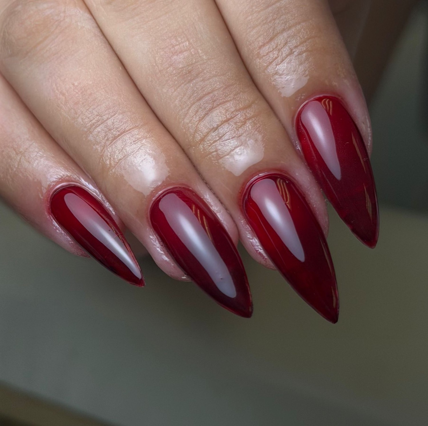 Wine stiletto color nails by Nelly Nails NY in East Williamsburg, Brooklyn